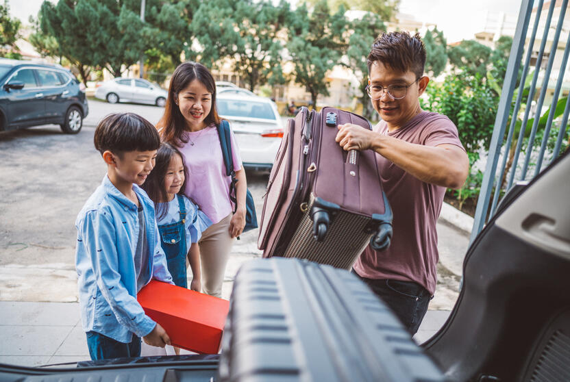 Driver carrying luggage